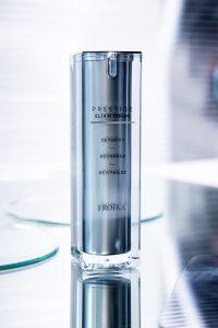 Prestige Elixir serum bottle with reflection