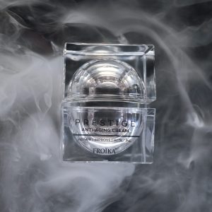 Froika Prestige Anti-aging Cream in grey background with smoke